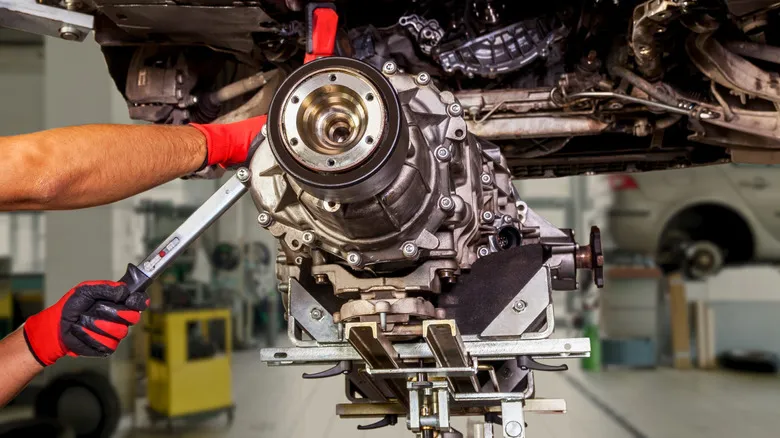 Vehicle engine bay being inspected